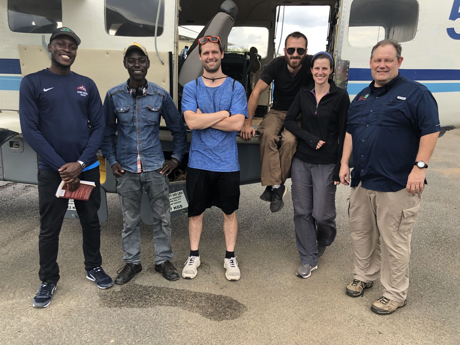 The SEA Partners team and local partners at the bush plane to Boma